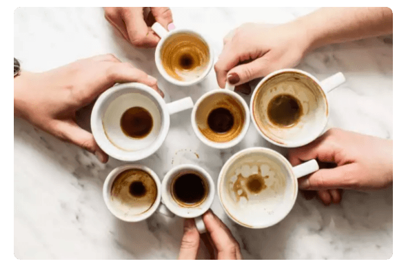 People Holding Empty Cups of Coffee | TimesOfIndia.com