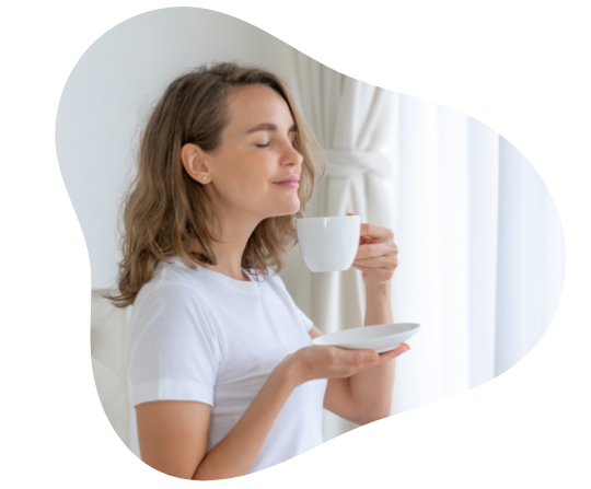 Woman enjoying in morning coffee