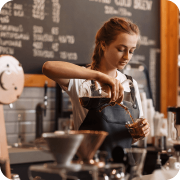 Woman making coffee