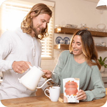 Couple making coffee