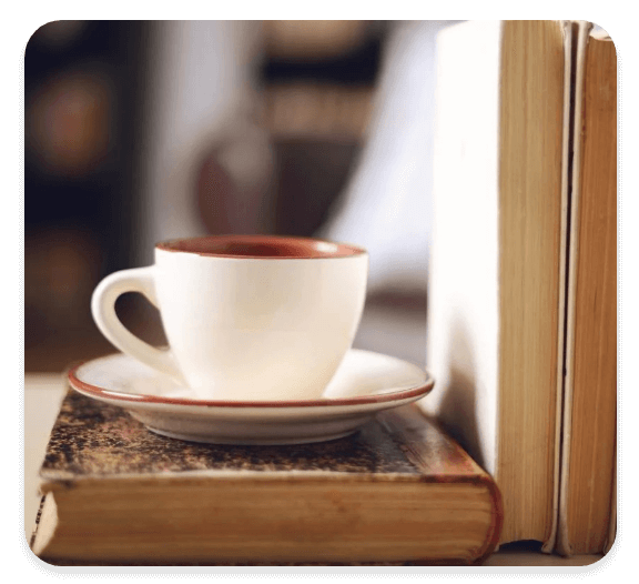 Coffee Cup and Books