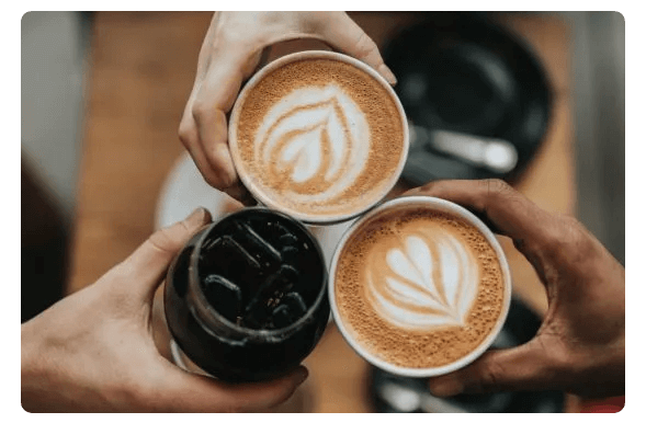 People Holding Cups of Coffee | Photo by nathan-dumlao-6VhPY27jdps-unsplash